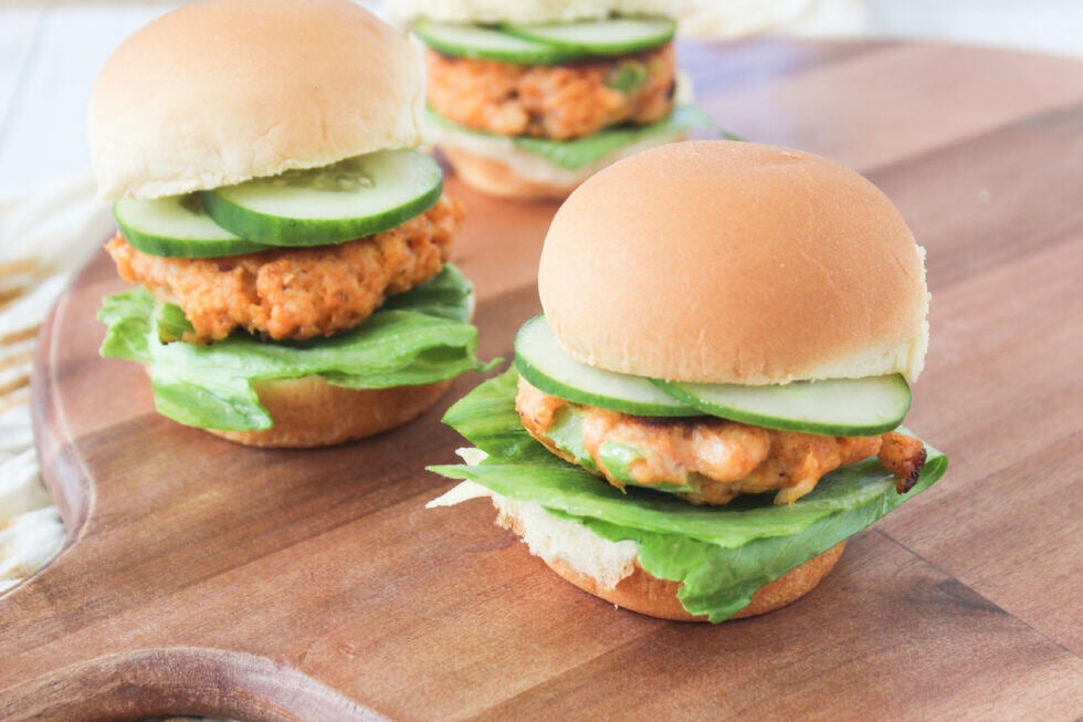 Salmon sliders with cucumber and lettuce 